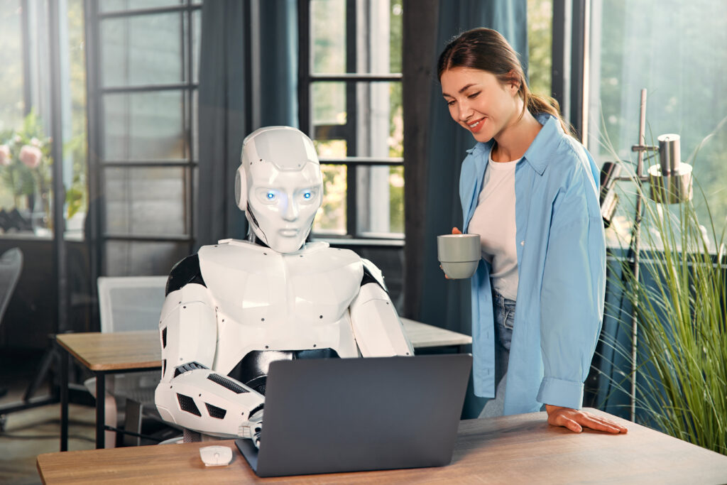 An AI robot & Small Business Owner in front of the laptop